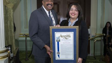 Assemblywoman Carrillo presents a resolution to Dr Robert Ross 